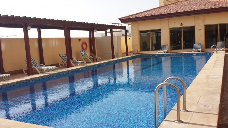 Sunny and Bright | With Balcony | Full Pool and Gym Access |