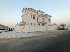 I own a villa. Corner of two streets, personal finishing, in an excellent location, next to Al Raqai