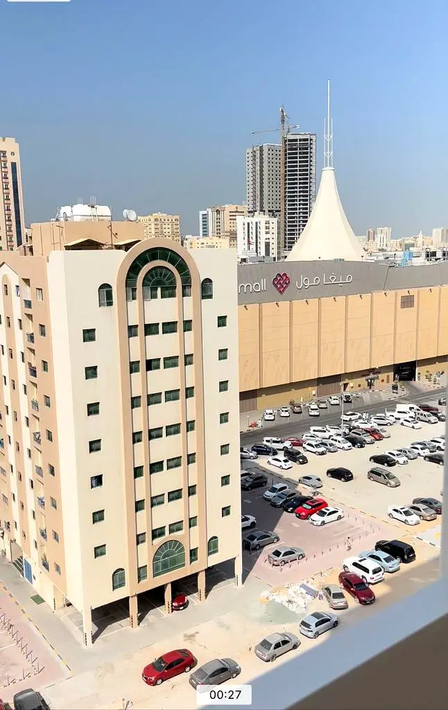 Apartment for sale in Afamia Tower 2, Al Qassimia / Sharjah, directly opposite Mega Mall