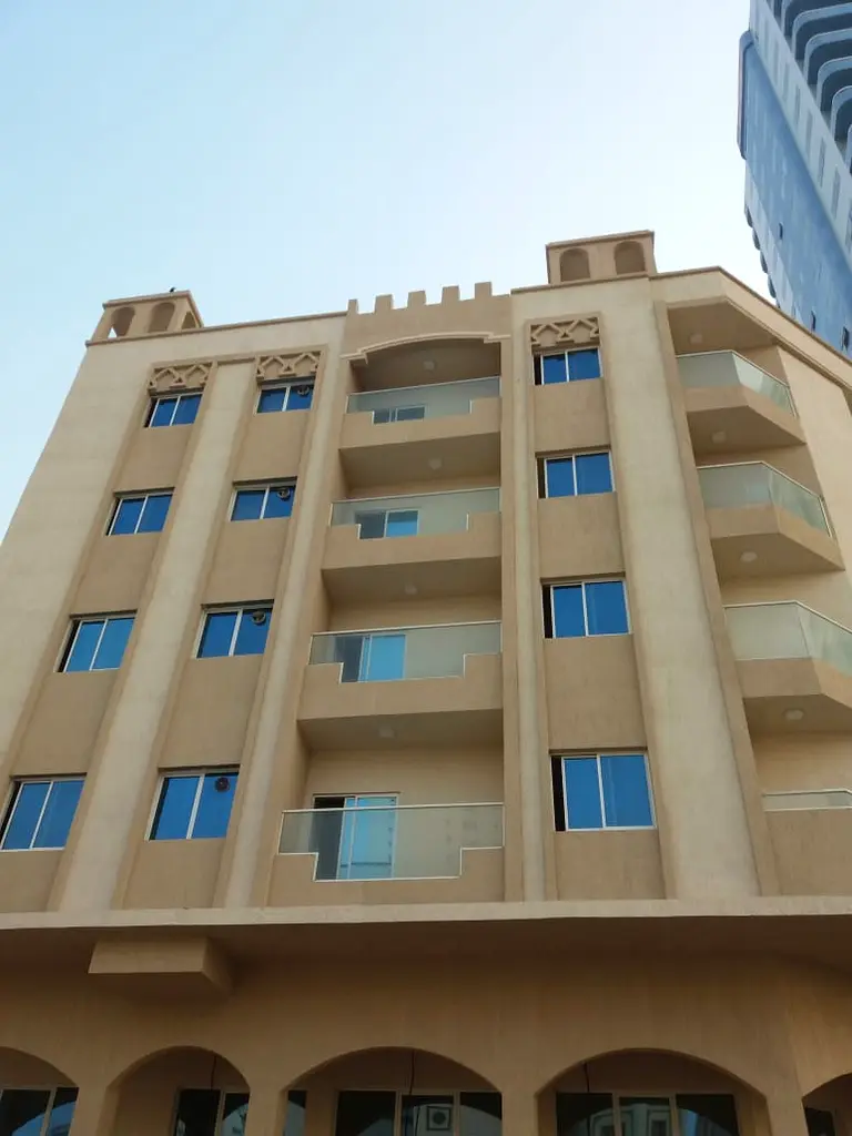 For sale a building in Ajman Al Nakheel 2, consisting of 4 floors + ground (3 studios, 16 1BHK, 6 2B