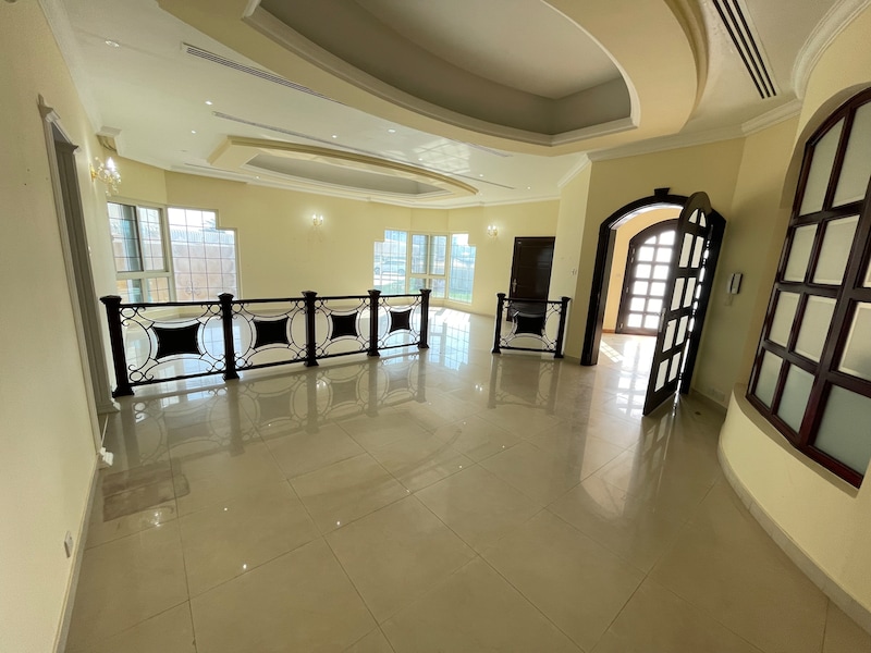 For rent, a villa with 5 master bedrooms, a majlis, and two halls, Al Muhai