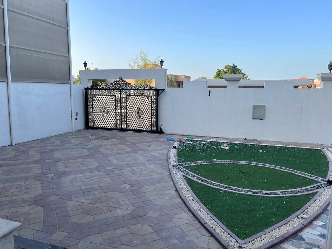 NICE VILLA FOR SALE ON MAIN ROAD AL ROWDHA 3 AJMAN WITH 5 MASTER BEDROOMS, 2 HALLS, AND MAJLIS