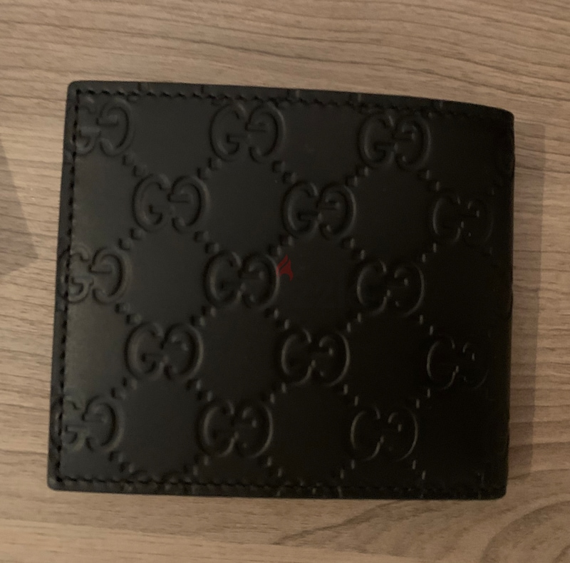 Gucci original men's wallet. Never used gift | dubizzle