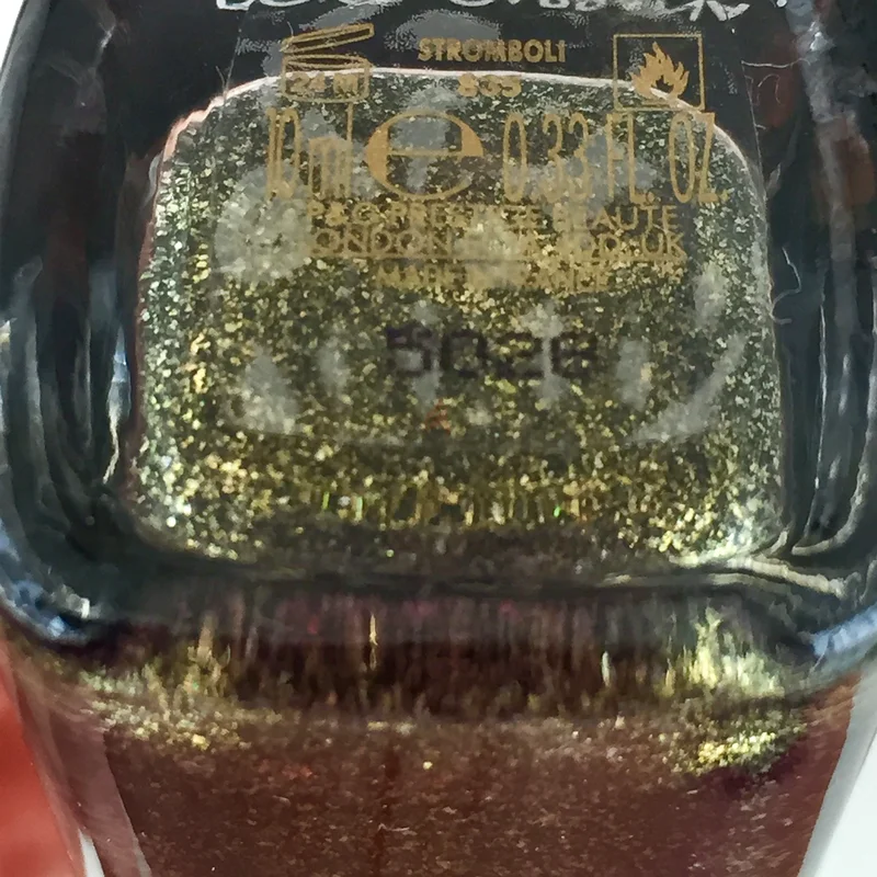 Dolce Gabbana sparkling golden nail polish new63242172619649111