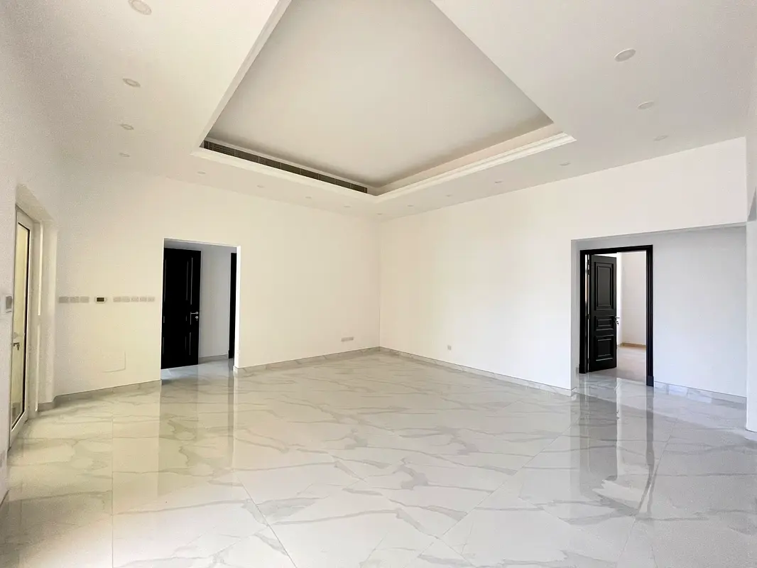 Very nice villa for rent in al khawaneej ( 4 bedroom + hall + majlas + parking + maid room )