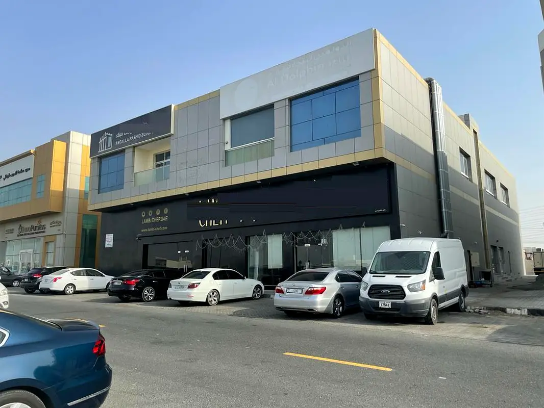 For sale a new commercial building in the Emirate of Sharjah on the main of  Maliha Street