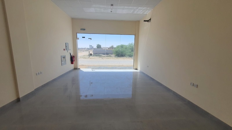 BRAND NEW BIG SHOPS FOR RENT 650/SQFT WITH ELECTRICITY AND WATER IN AL SAJAA NEAR TO CEMENT FACTORY.