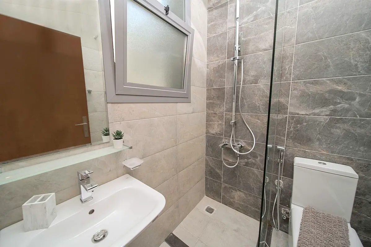 There is a villa for sale consisting of 4 master rooms, a hall, a council and a car park, modern fin