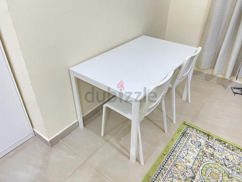 White Ikea Dining Table With 2 Chairs | dubizzle