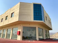 Building For Sale In Masfout, Basin 8, Opposite Masfout Court, On A Main Street, Next To All Service