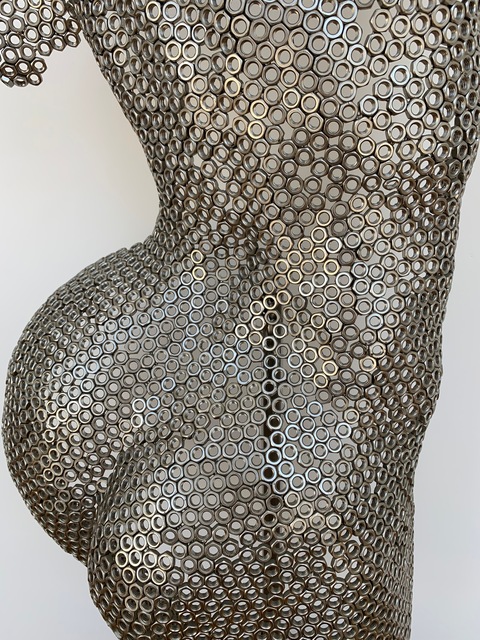 ART female Body statue made out of screws