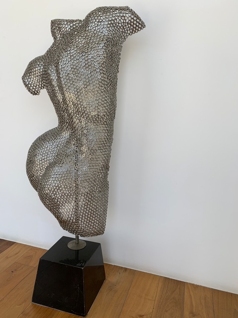 ART female Body statue made out of screws