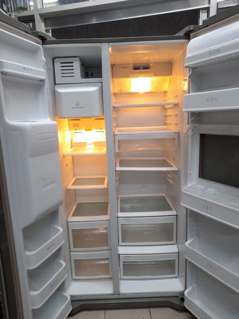 Lg side by side fridge with water dispenser and ice maker