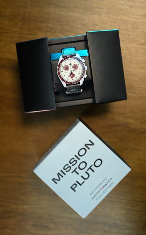 Mission to PLUTO , Swatch , OMEGA
