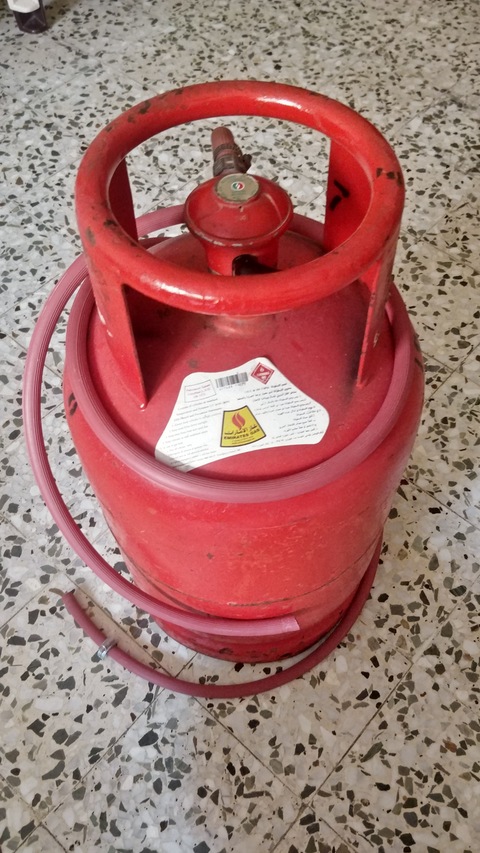 Gas cylinder with regulator pipe