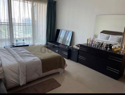 huge master bedroom with panoramic view of marina
