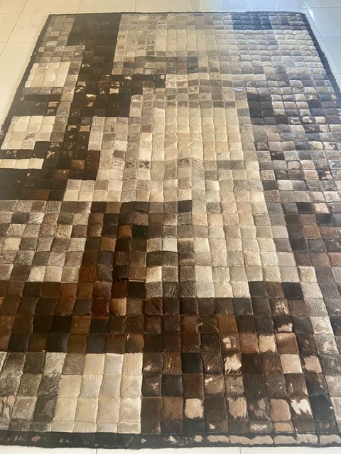 Papillio cowhide patchwork rug