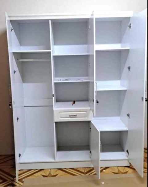 Brand New 3 door cabinet with shelf