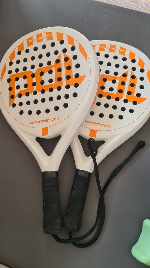 Carbon fiber/fiberglass tennis paddle