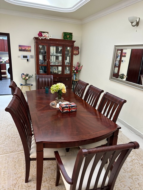 Dining table plus chairs and cabinet