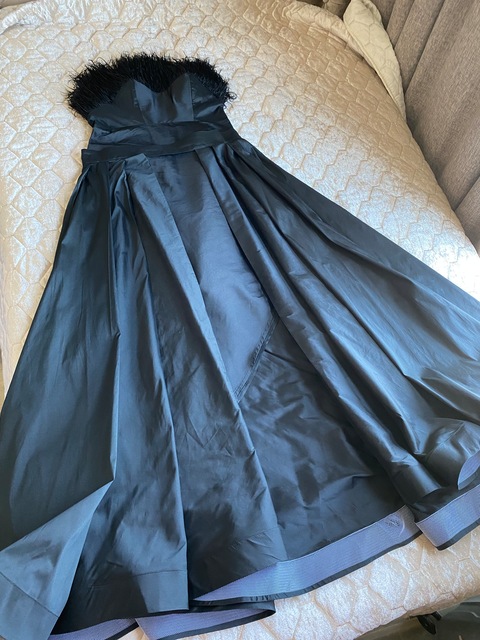 Black dress with fur with its seperate skirt for sale