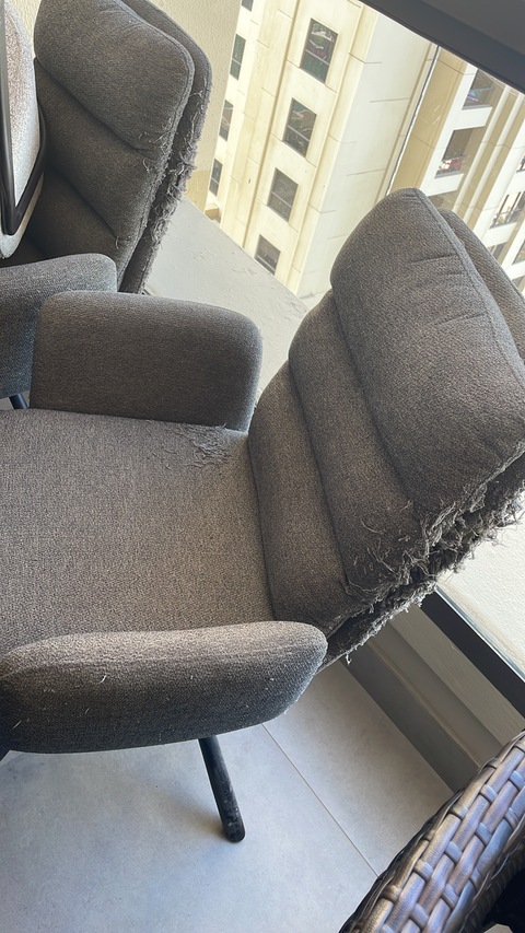 grey swivel desk chair , damage by cats, need upholstery