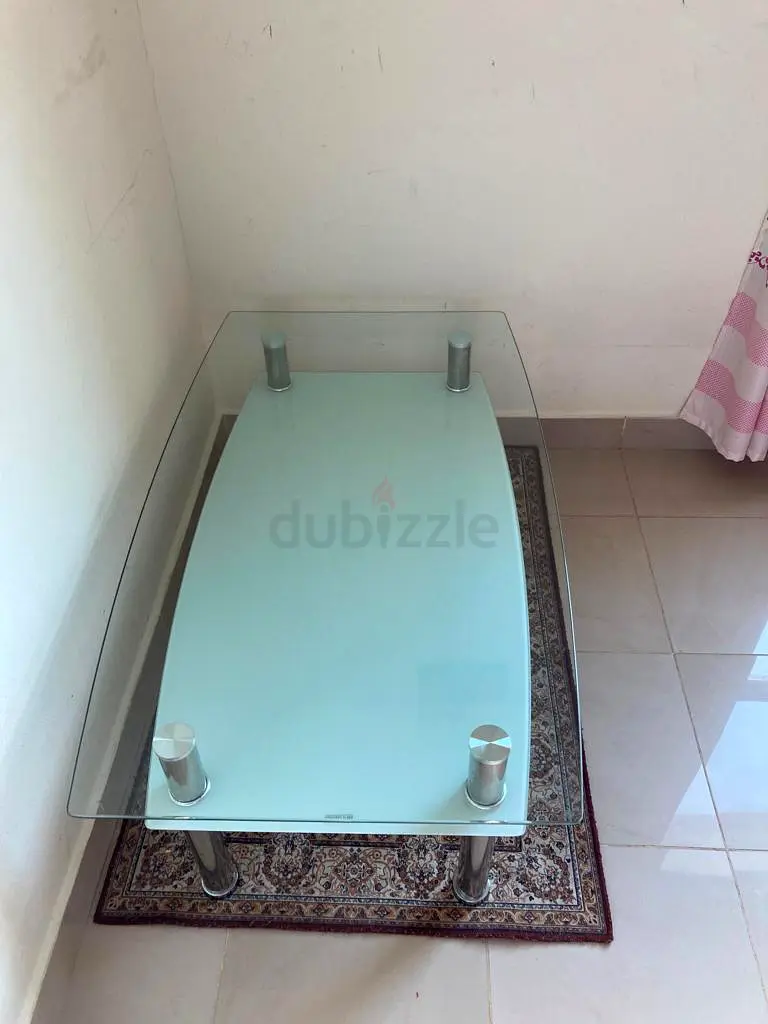 Glass top coffee table