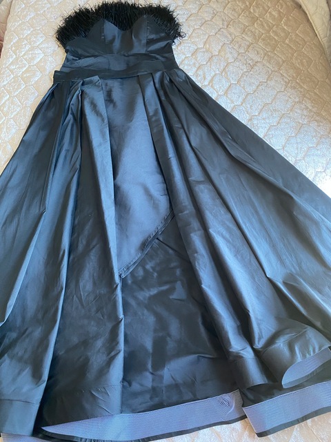 Black dress with fur with its seperate skirt for sale