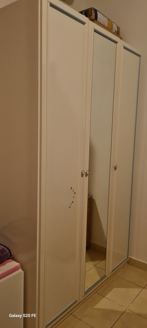 white cabinet 3 doors