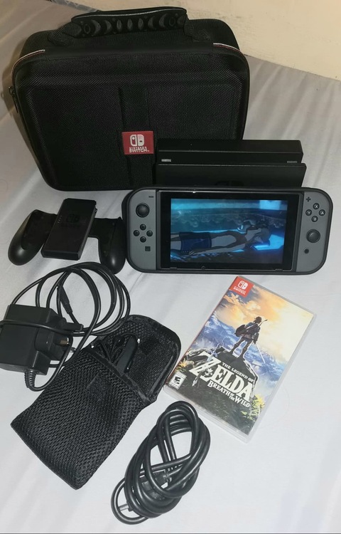 Nintendo switch +1 game with bag for sale