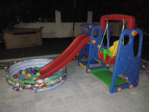 Playset swing slide with ball pool