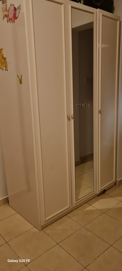 white cabinet 3 doors