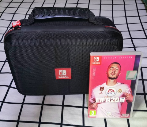 NINTENDO SWITCH +1 GAMES WITH BAG