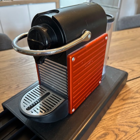 Nespresso Pixie coffee machine with accessories