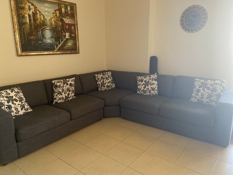 L shaped sofa set in excellent condition (free coffee table)