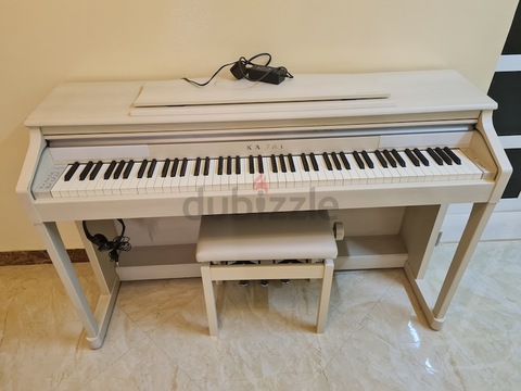 Kawai CA15 wooden key piano as good as new in working. Cash on Free Delivery with six months warrant