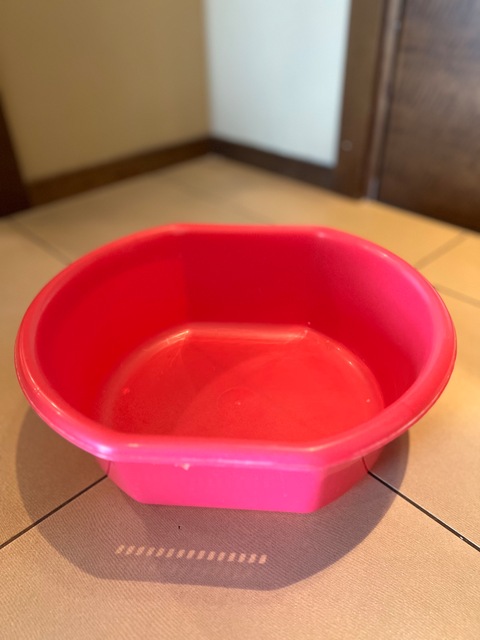Pink plastic bowl