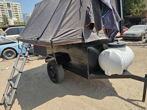 camping storage trailer with tent orbit