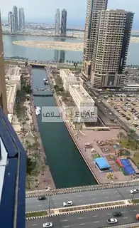 A Large Area With A Wonderful View Of Al Qasba And Khalid Lake + 2 Parking