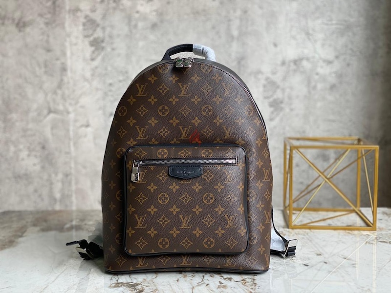 Louis vuitton brown monogram josh backpack