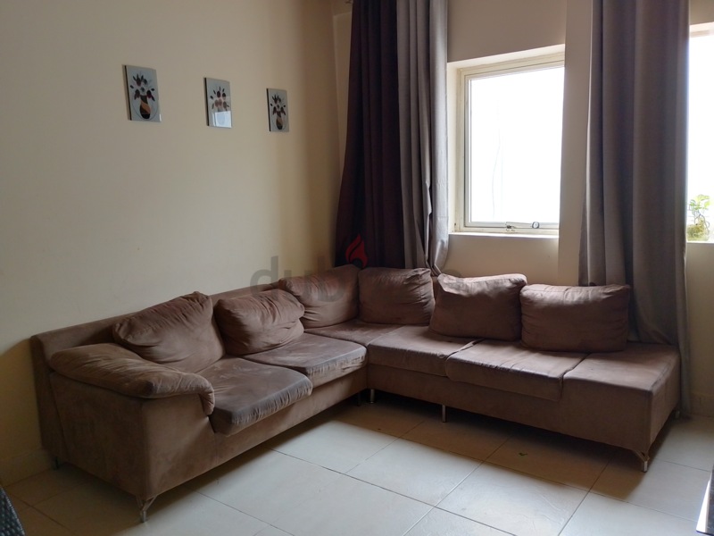 L shape on sale sofa used