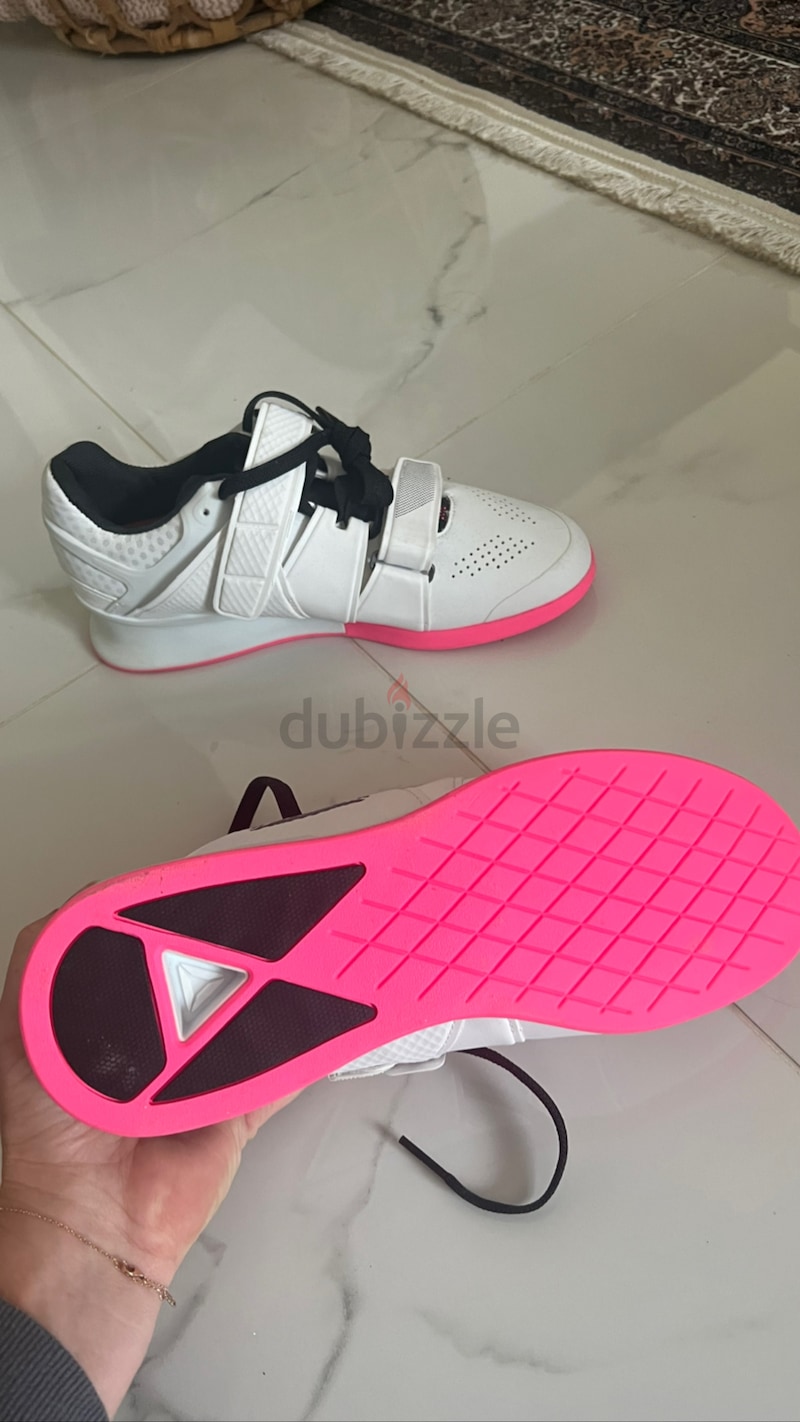 Pink top reebok lifters