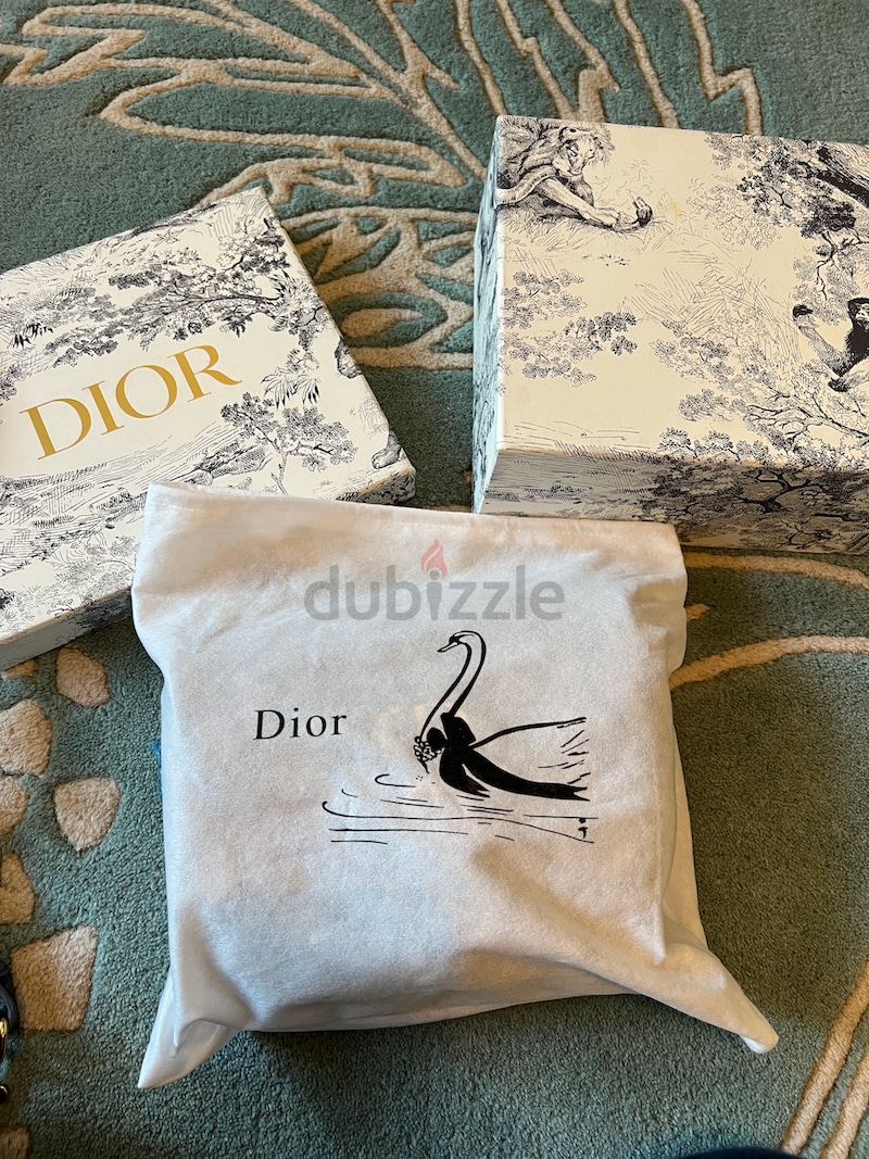 Dior dust bag with on sale swan