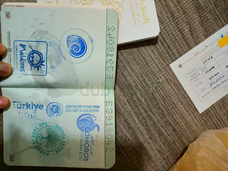 Dubai expo passports white and yellow with 110 country stamps