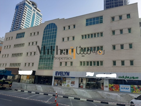 Building For Sale In Al Majaz 1, Directly On King Faisal Street