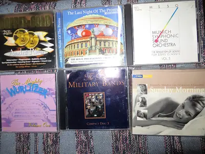 COLLECTION OF ORIGINAL MUSIC CDs