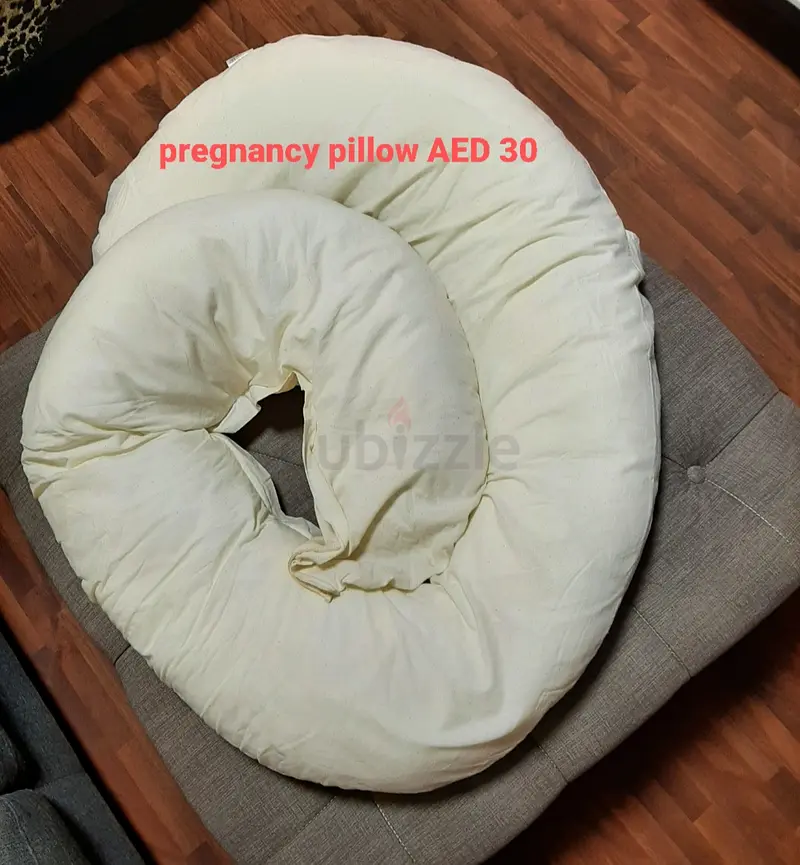 Cot with mobile / pregnancy pillow