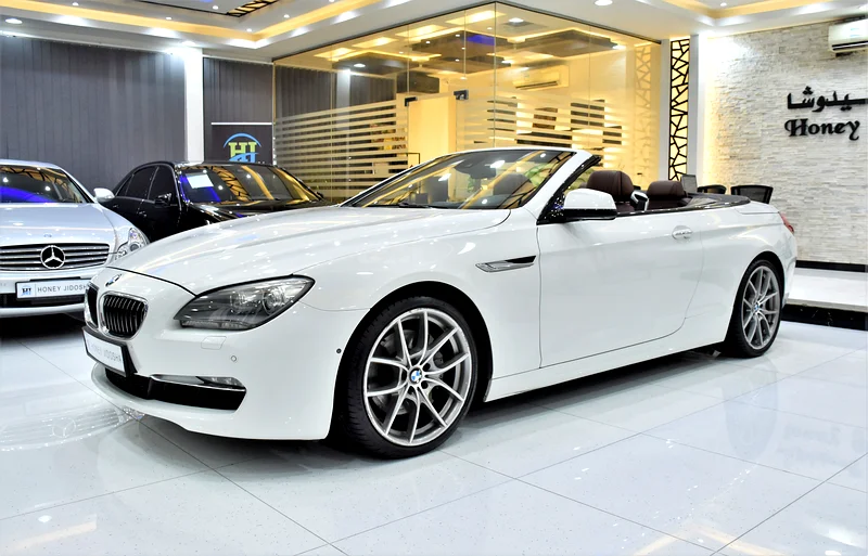 EXCELLENT DEAL for our BMW 650i CONVERTIBLE (2011 Model) in White Color, GCC Specs63230142124803111