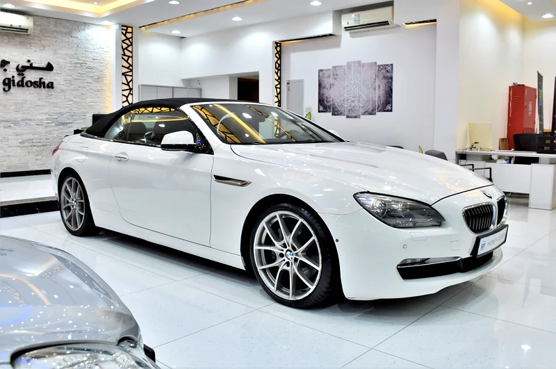 EXCELLENT DEAL for our BMW 650i CONVERTIBLE (2011 Model) in White Color, GCC Specs63230142124803112