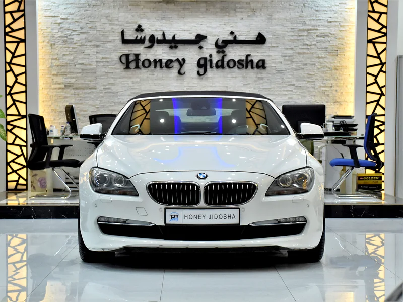 EXCELLENT DEAL for our BMW 650i CONVERTIBLE (2011 Model) in White Color, GCC Specs63230142124803118